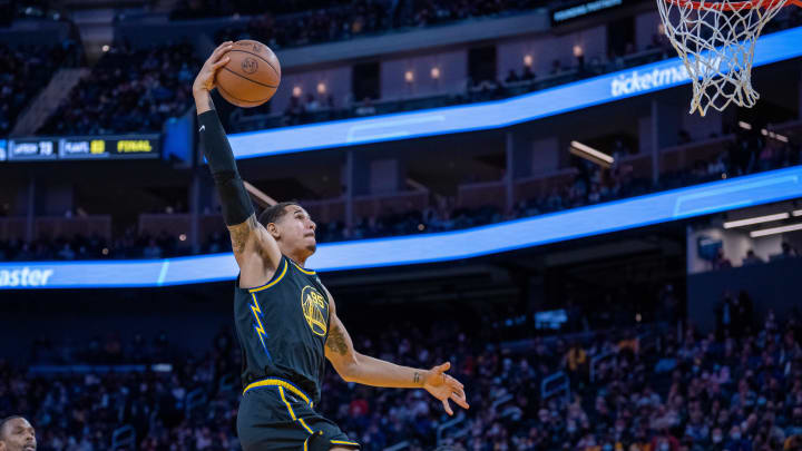 Feb 3, 2022; San Francisco, California, USA; Golden State Warriors forward Juan Toscano-Anderson (95) dunks the basketball during the fourth quarter against the Sacramento Kings at Chase Center. Mandatory Credit: Neville E. Guard-USA TODAY Sports