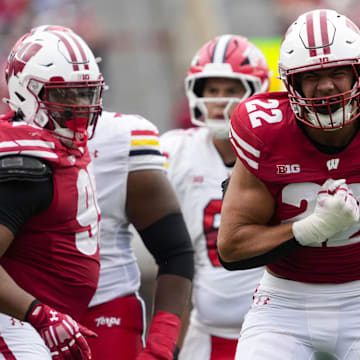 Sep 20, 2025; Madison, Wisconsin, USA;  Wisconsin Badgers linebacker Mason Reiger (22) reacts following a tackle during the third quarter against the Maryland Terrapins at Camp Randall Stadium.
