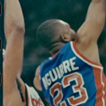 06/10/1990; Portland, Oregon USA; Pistons'' Mark Aguirre lays up the ball to the net being guarded by Trailblazers' Buck Williams during game three of the 1990 NBA Finals at The Memorial Coliseum. Mandatory Credit: Craig Porter -Detroit Free Press