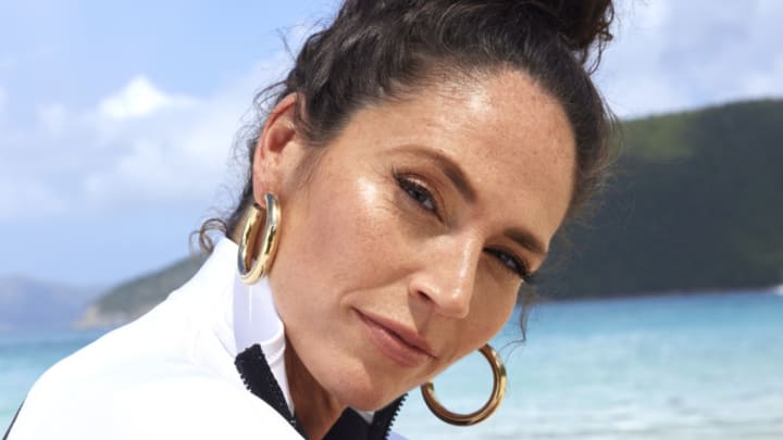 Sue Bird was photographed by Laretta Houston in St. Thomas. Swimsuit by Gigi C. Earrings by Eklexic.