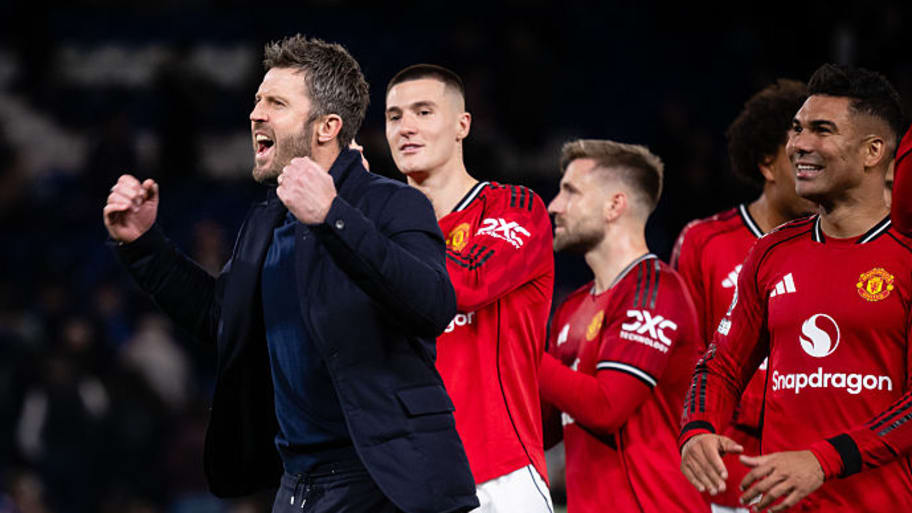 Michael Carrick celebrating with his players. 