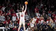 Nov 27, 2024; Cincinnati, Ohio, USA; Cincinnati Bearcats guard Simas Lukosius (41) attempts a 3-point shot against the Alabama State Hornets in the second half at Fifth Third Arena. Mandatory Credit: Aaron Doster-Imagn Images