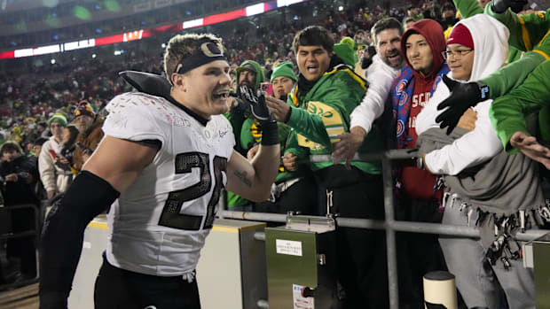 Nov 16, 2024; Madison, Wisconsin, USA;  Oregon Ducks linebacker Bryce Boettcher (28) celebrates with fans following the game 