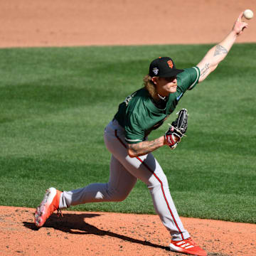 Jul 8, 2023; Seattle, Washington, USA; National League Futures relief pitcher Carson Whisenhunt (18) of the San Francisco Giants pitches to the American League during the third inning of the All-Star Futures game at T-Mobile Park.