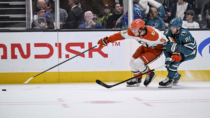Apr 1, 2026; San Jose, California, USA; Anaheim Ducks center Leo Carlsson (91) and San Jose Sharks center Alexander Wennberg (21) go for the puck during the first period at SAP Center at San Jose. Mandatory Credit: Justine Willard-Imagn Images