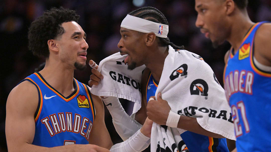 Thunder guard Jared McCain and Shai Gilgeous-Alexander celebrate in the final minutes of Game 3 against the Lakers.