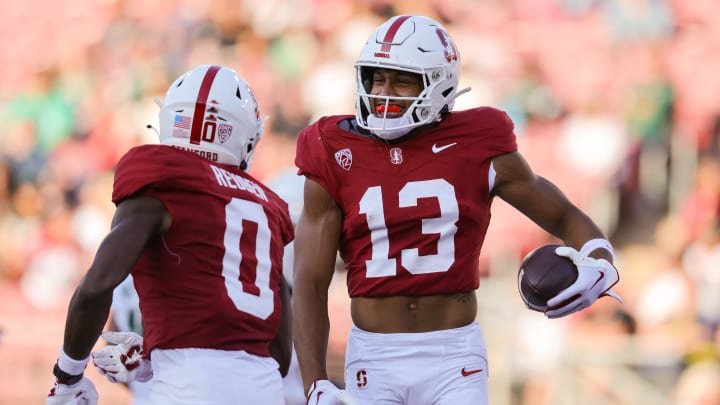 Sep 16, 2023; Stanford, California, USA; Stanford Cardinal wide receiver Elic Ayomanor (13) celebrates after catching  a touchdown pass during the second quarter against the Sacramento State Hornets at Stanford Stadium. Mandatory Credit: Sergio Estrada-USA TODAY Sports