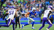 Nov 30, 2025; Seattle, Washington, USA; Seattle Seahawks running back Zach Charbonnet (26) runs the ball after a catch during the second half against the Minnesota Vikings at Lumen Field. Mandatory Credit: Steven Bisig-Imagn Images