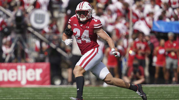 Wisconsin high school football: Wisconsin Badgers' safety Hunter Wohler sprints downfield during a non-conference game. 2024