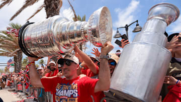 Jun 22, 2025; Fort Lauderdale, Florida, UNITED STATES; Florida Panthers center Brad Marchand (63) celebrates with the Stanley Cup during the Stanley Cup championship parade and rally. 