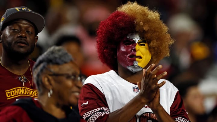 Aug 25, 2024; Landover, Maryland, USA; Fans cheer during the second quarter during a preseason game between the Washington Commanders and the New England Patriots at Commanders Field. Mandatory Credit: Peter Casey-USA TODAY Sports