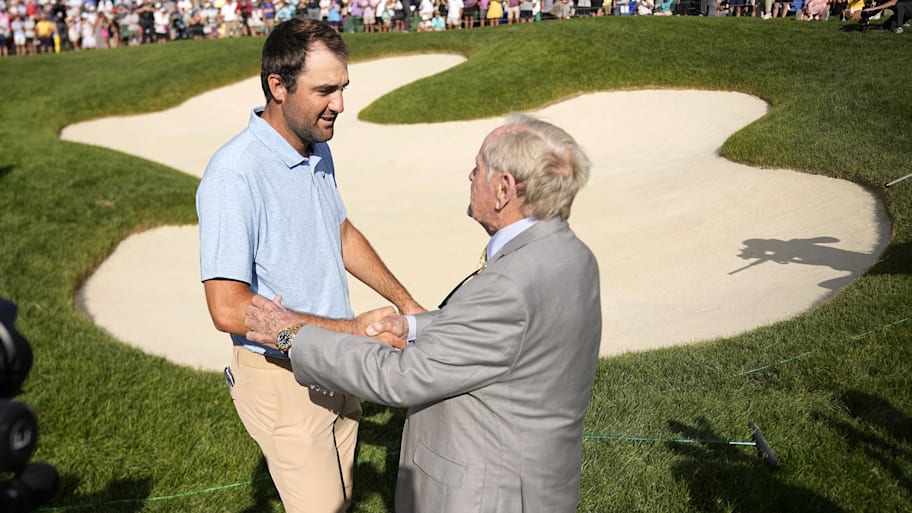 Scottie Scheffler, visiting with Jack Nicklaus after winning the 2025  Memorial Tournament, is back to defend.  | Adam Cairns-Imagn Images