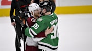 May 3, 2025; Dallas, Texas, USA; Colorado Avalanche center Nathan MacKinnon (29) hugs Dallas Stars right wing Mikko Rantanen (96) after the Stars defeats the Avalanche in game seven of the first round of the 2025 Stanley Cup Playoffs at American Airlines Center. Mandatory Credit: Jerome Miron-Imagn Images