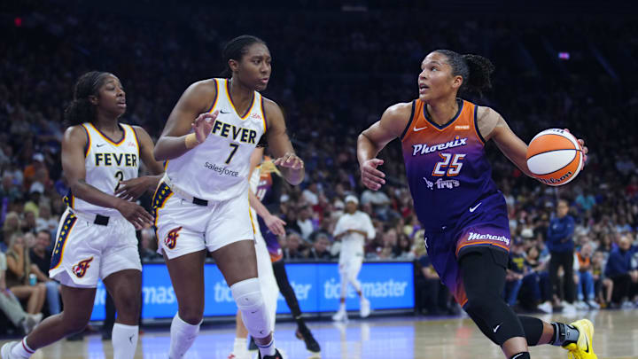Mercury guard Alyssa Thomas (25) drives against Fever forward Aliyah Boston (7) at PHX Arena in Phoenix on Aug. 7, 2025. Mercury guard Alyssa Thomas (25) drives against Fever forward Aliyah Boston (7) at PHX Arena in Phoenix on Aug. 7, 2025.