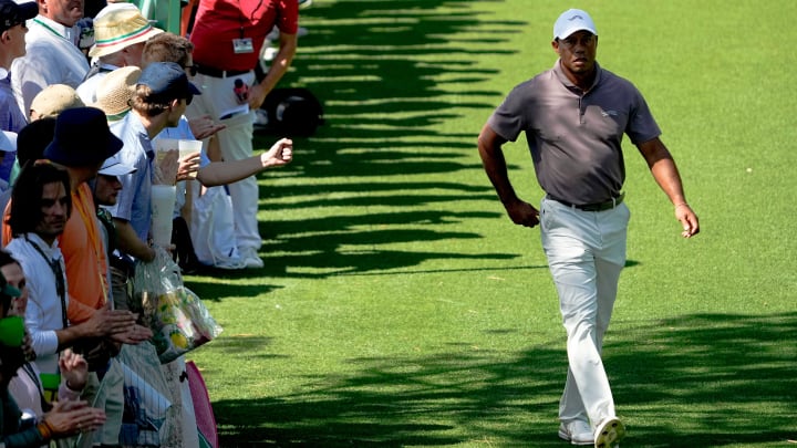 Apr 12, 2024; Augusta, Georgia, USA; Tiger Woods walks to the no. 18 tee during the second round of