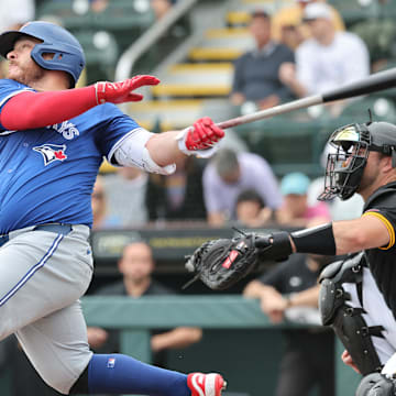 Bradenton, Florida, USA; Toronto Blue Jays catcher Alejandro Kirk (30) hits a home run during the second inning against the Pittsburgh Pirates  at LECOM Park.