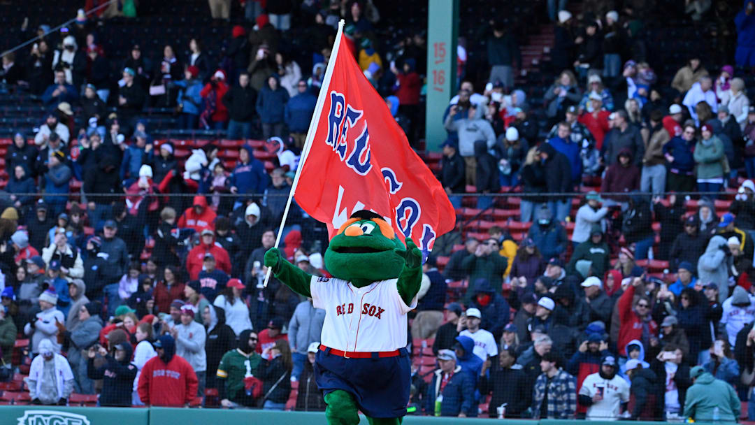 Apr 8, 2026; Boston, Massachusetts, USA; Wally the Boston Red Sox mascot celebrates the team's victory against the Milwaukee Brewers at Fenway Park. Mandatory Credit: Eric Canha-Imagn Images