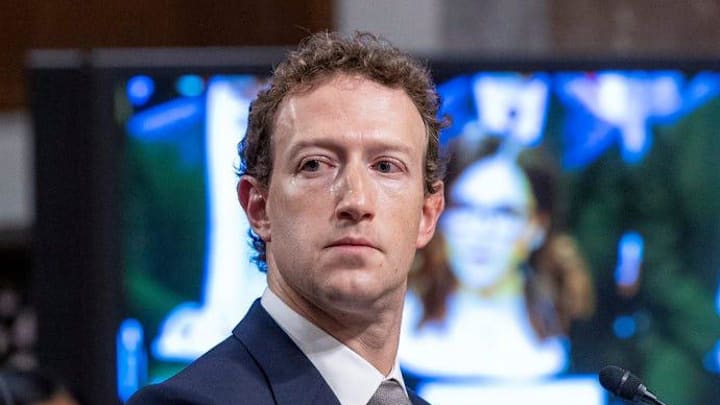 Mark Zuckerberg, CEO and founder of Meta, looks on