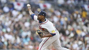 Mar 30, 2025; San Diego, California, USA; Atlanta Braves relief pitcher Hector Neris (50) delivers during the eighth inning against the San Diego Padres at Petco Park. Mandatory Credit: Denis Poroy-Imagn Images