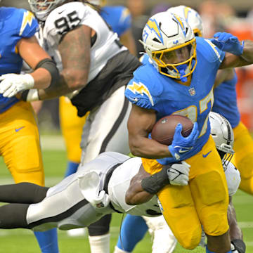 Los Angeles Chargers running back J.K. Dobbins (27) breaks away 