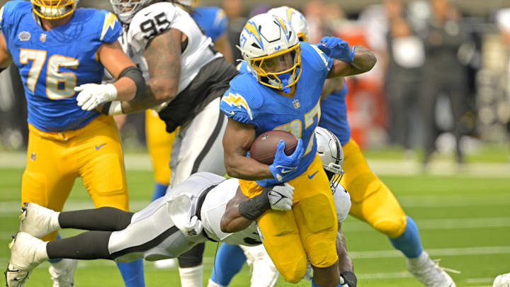 Los Angeles Chargers running back J.K. Dobbins (27) breaks away 