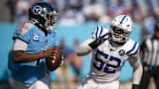 Sep 21, 2025; Nashville, Tennessee, USA;  Indianapolis Colts defensive end Samson Ebukam (52) chases after Tennessee Titans quarterback Cameron Ward (1) during the second half at Nissan Stadium. 
