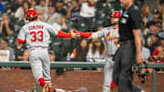 Sep 24, 2025; San Francisco, California, USA; St. Louis Cardinals first baseman Alec Burleson (41) and St. Louis Cardinals second baseman Brendan Donovan (33) celebrate after scoring against the San Francisco Giants during the third inning at Oracle Park. Mandatory Credit: Neville E. Guard-Imagn Images