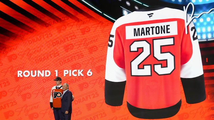 Porter Martone is selected as the sixth overall pick to the Philadelphia Flyers in the first round of the 2025 NHL Draft at Peacock Theater. Porter Martone is selected as the sixth overall pick to the Philadelphia Flyers in the first round of the 2025 NHL Draft at Peacock Theater.