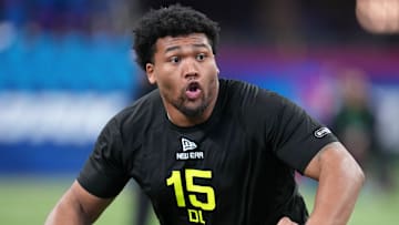 Feb 27, 2025; Indianapolis, IN, USA; Oregon defensive lineman Derrick Harmon (DL15) participates in drills during the 2025 NFL Combine at Lucas Oil Stadium. Mandatory Credit: Kirby Lee-Imagn Images