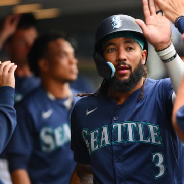 Seattle Mariners shortstop J.P. Crawford celebrates after scoring a run against the Los Angeles Angels on July 22 at T-Mobile Park.