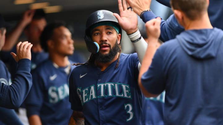 Seattle Mariners shortstop J.P. Crawford celebrates after scoring a run against the Los Angeles Angels on July 22 at T-Mobile Park.