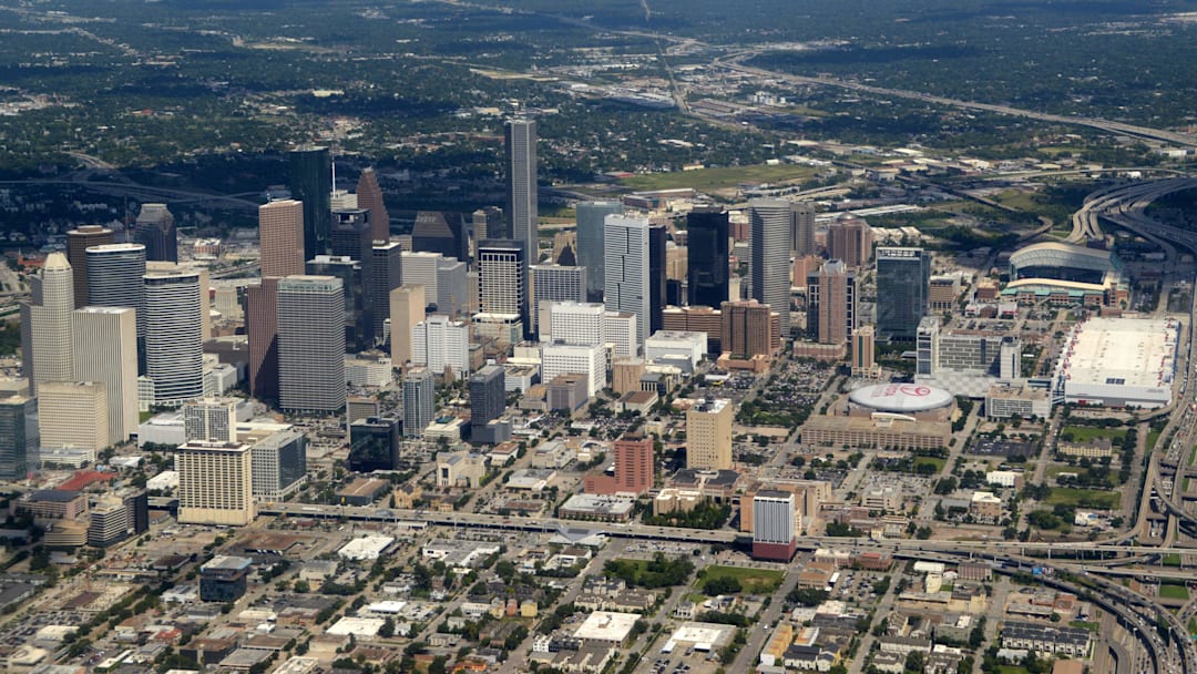 Oct 9, 2014; Houston, TX, USA; General aerial view of the downtown Houston skyline and the Toyota Center and Minute Maid Park before the NFL game between the Indianapolis Colts and the Houston Texans at NRG Stadium. Mandatory Credit: Kirby Lee-Imagn Images