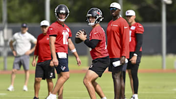 Jun 10, 2025; Houston, TX, USA; Houston Texans quarterback Kedon Slovis (16) participates in a drill during an NFL football minicamp at NRG Stadium. Mandatory Credit: Maria Lysaker-Imagn Images 