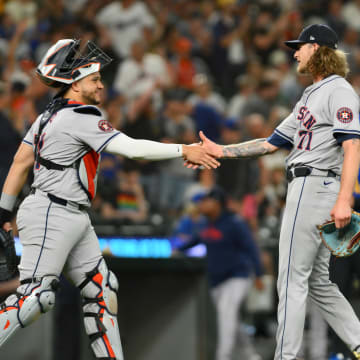Jul 19, 2024; Seattle, Washington, USA; Houston Astros catcher Yainer Diaz (21) and relief pitcher Josh Hader (71) celebrate defeating the Seattle Mariners at T-Mobile Park.