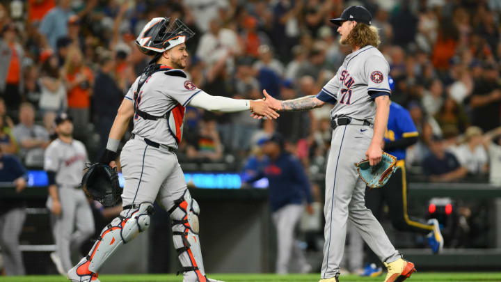 Jul 19, 2024; Seattle, Washington, USA; Houston Astros catcher Yainer Diaz (21) and relief pitcher Josh Hader (71) celebrate defeating the Seattle Mariners at T-Mobile Park