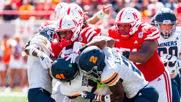 Nebraska Cornhuskers running back Dante Dowdell (23) runs against UTEP Miners linebacker Dorian Hopkins (41).