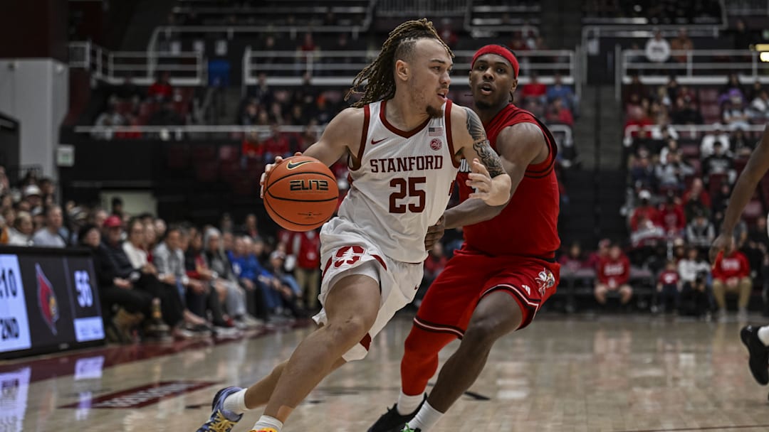 Jan 2, 2025; Stanford, California, USA; Stanford Cardinal guard Jeremy Dent-Smith (25) dribbles against Louisville Cardinals guard Ryan Conwell (3) during the second half at Maples Pavilion. Mandatory Credit: Justine Willard-Imagn Images Jan 2, 2025; Stanford, California, USA; Stanford Cardinal guard Jeremy Dent-Smith (25) dribbles against Louisville Cardinals guard Ryan Conwell (3) during the second half at Maples Pavilion. Mandatory Credit: Justine Willard-Imagn Images
