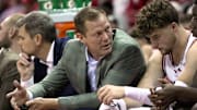 Wisconsin associate head coach John Krabbenhoft talks with guard Max Klesmit (11) during the first half of their preseason game against UW-River Falls Wednesday, October 30, 2024 at the Kohl Center in Madison, Wisconsin.
