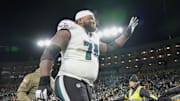 Nov 10, 2025; Green Bay, Wisconsin, USA;  Philadelphia Eagles offensive tackle Fred Johnson (74) waves to the crowd following the game against the Green Bay Packers at Lambeau Field. Mandatory Credit: Jeff Hanisch-Imagn Images
