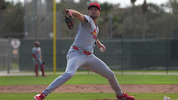 Feb 17, 2025; Jupiter, FL, USA;  St. Louis Cardinals pitcher Matthew Liberatore (52) pitches live batting practice at spring training. Mandatory Credit: Jim Rassol-Imagn Images