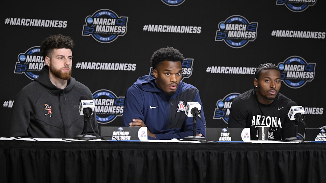 Arizona Wildcats guard Anthony Dell'orso (3), forward Tobe Awaka (30), and guard Jaden Bradley (0) address the media in a press conference during a practice session ahead of the west regional of the men's 2026 NCAA Tournament at SAP Center. 
