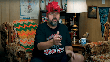 SEC Roll Call's Matt Mitchell acts as an Arkansas coach recruiting fans to cheer on the Razorbacks in this YouTube comedy sketch.