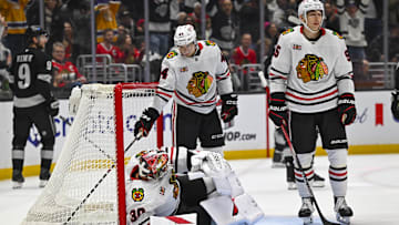 Dec 6, 2025; Los Angeles, California, USA; Chicago Blackhawks goaltender Spencer Knight (30), defenseman Wyatt Kaiser (44), and right wing Ilya Mikheyev (95) react after failing to defend a goal against the Los Angeles Kings during the second period at Crypto.com Arena. Mandatory Credit: Jonathan Hui-Imagn Images