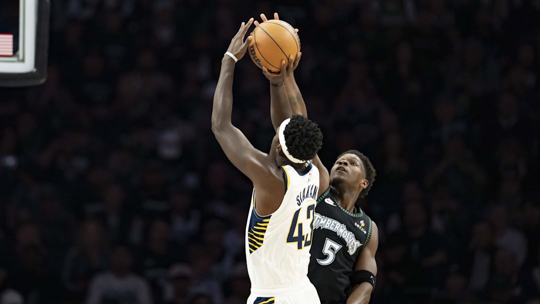 Oct 26, 2025; Minneapolis, Minnesota, USA; Minnesota Timberwolves guard Anthony Edwards (5) blocks a shot from Indiana Pacers forward Pascal Siakam (43) in the first half at Target Center. Mandatory Credit: Jesse Johnson-Imagn Images
