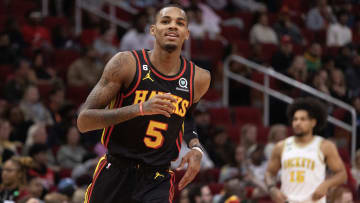 Nov 25, 2022; Houston, Texas, USA;  Atlanta Hawks guard Dejounte Murray (5) celebrates his three point basket against the Houston Rockets in the second quarter at Toyota Center.