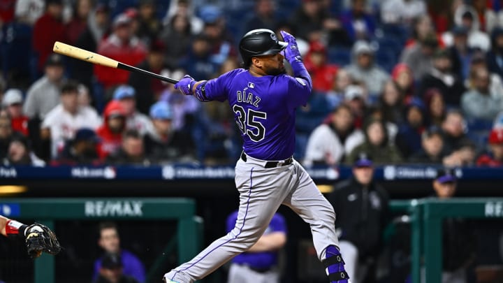 Apr 17, 2024; Philadelphia, Pennsylvania, USA; Colorado Rockies catcher Elias Diaz (35) hits a single against the Philadelphia Phillies in the eighth inning at Citizens Bank Park. Mandatory Credit: Kyle Ross-USA TODAY Sports
