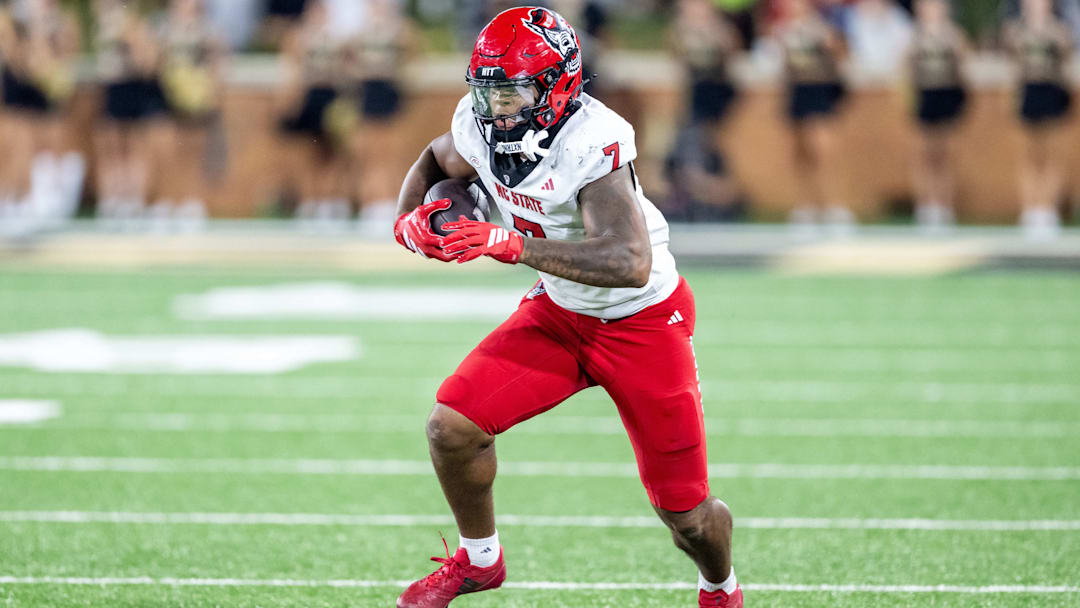 Sep 11, 2025; Winston-Salem, North Carolina, USA; North Carolina State Wolfpack tight end Justin Joly (7) catches a pass against the Wake Forest Demon Deacons in second half at Allegacy Federal Credit Union Stadium. Mandatory Credit: Luke Jamroz-Imagn Images