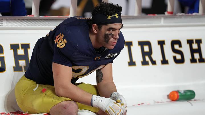 Jan 20, 2025; Atlanta, GA, USA; Notre Dame Fighting Irish linebacker Drayk Bowen (34) reacts on the bench after losing to the Ohio State Buckeyes in the CFP National Championship college football game at Mercedes-Benz Stadium. Mandatory Credit: Kirby Lee-Imagn Images