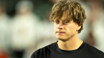 Cincinnati Bengals quarterback Joe Burrow (9) walks onto the field