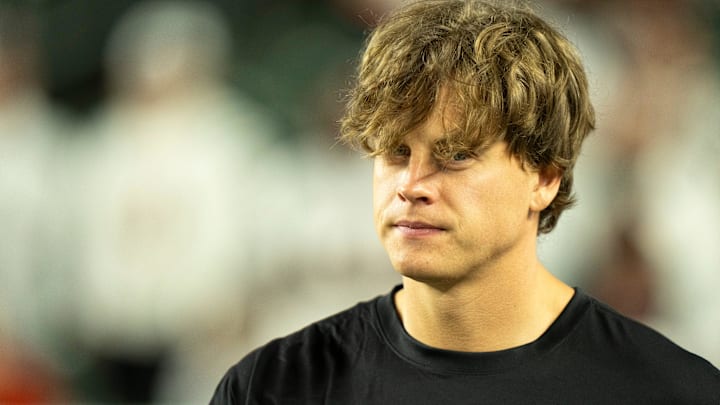 Cincinnati Bengals quarterback Joe Burrow (9) walks onto the field